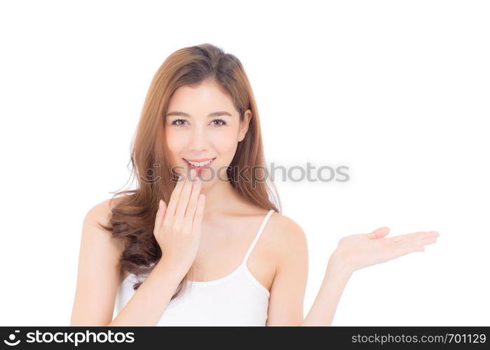 Portrait of asian beautiful young woman showing with healthy clean skin presenting something empty copy space on the hand isolated on white background, beauty concept.