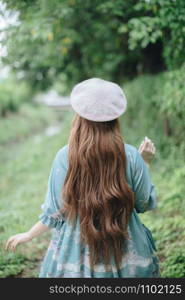 Portrait of asian girl in lolita fashion dress in garden background