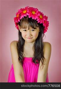 Portrait of asian little girl in pink dress. portrait of asian little girl