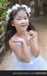 Portrait of asian little girl in white dress. Portrait of asian little girl