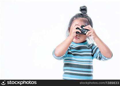 portrait of asian little girl taking a photograph over white background. portrait of asian little girl