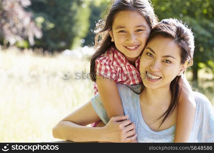 Portrait Of Asian Mother And Daughter In Countryside