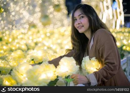 Portrait of asian woman, outdoor in night. Christmas and New Year concept