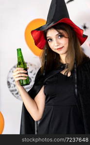 Portrait of asian young adult teenage woman wear Halloween costume cloth for Halloween party carnival. Halloween celebrate and international holiday concept.