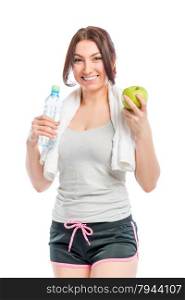 portrait of athlete with an apple and a bottle of water