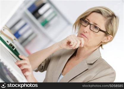 portrait of attractive businesswoman sitting at office