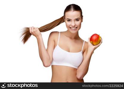 portrait of attractive caucasian smiling woman holding apple isolated on white. portrait of attractivesmiling woman holding apple isolated on white