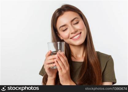 portrait of attractive caucasian smiling woman isolated on white studio shot drinking water. portrait of attractive caucasian smiling woman isolated on white studio shot drinking water.