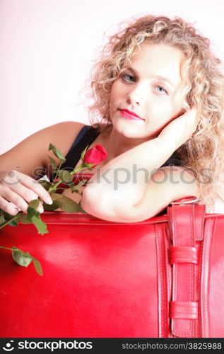 portrait of attractive caucasian woman blond wait red rose