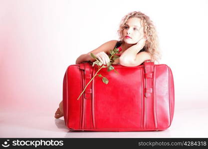 portrait of attractive caucasian woman blond wait red rose