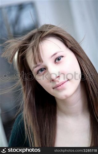 Portrait of attractive girl in a room