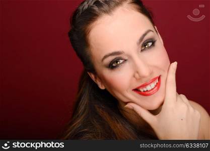 Portrait of attractive girl with red lips. Make up. Perfect skin