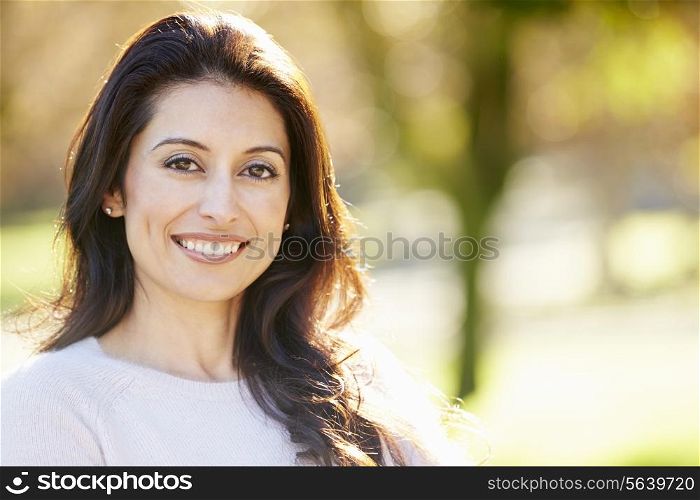 Portrait Of Attractive Hispanic Woman In Countryside