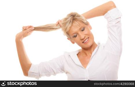 Portrait of attractive mature woman blonde holding her long healthy hair isolated on white background