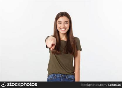 portrait of attractive smile laugh teenage girl, pointing her finger, wear green shirt, white teeth, brown long hair, isolated over white background. portrait of attractive smile laugh teenage girl, pointing her finger, wear green shirt, white teeth, brown long hair, isolated over white background.