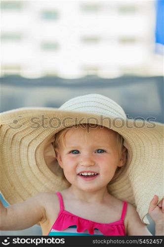 Portrait of baby in beach hat