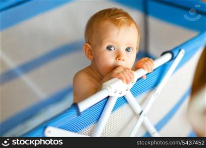 Portrait of baby in playpen&#xA;