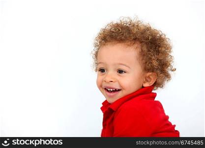 Portrait of baby with curly hair