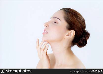 Portrait of beautiful asian brunette woman makeup of cosmetic, girl hand touch chin and smile attractive, face of beauty perfect with wellness isolated on white background with skin healthcare concept.