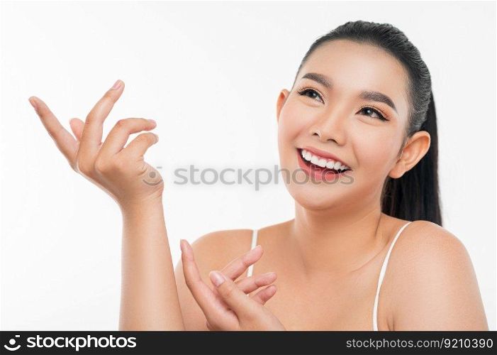 Portrait of Beautiful Asian woman skin care healthy hair and skin close up face beauty isolated over background. Cosmetology and Spa concept.