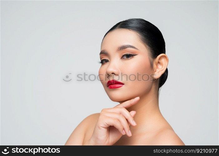 Portrait of Beautiful Asian woman skin care healthy hair and skin close up face beauty isolated over background. Cosmetology and Spa concept.
