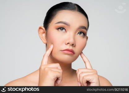 Portrait of Beautiful Asian woman skin care healthy hair and skin close up face beauty isolated over background. Cosmetology and Spa concept.