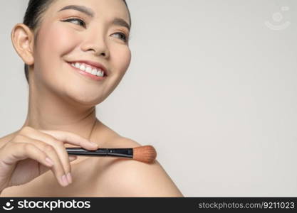 Portrait of Beautiful Asian woman skin care healthy hair and skin close up face beauty isolated over background. Cosmetology and Spa concept.