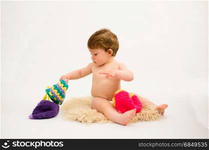 portrait of beautiful baby girl wearing a knitted crochet hat