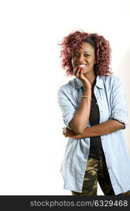 Portrait of beautiful black woman on white background. Red hairstyle Studio shot