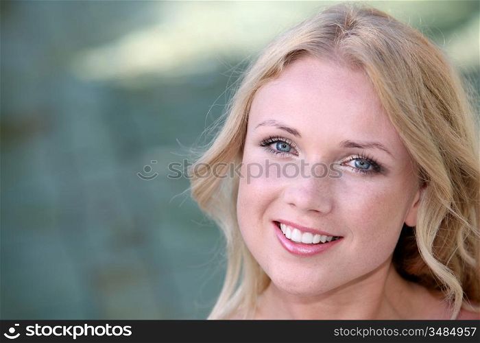 Portrait of beautiful blond woman in spa
