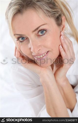 Portrait of beautiful blond woman in the morning