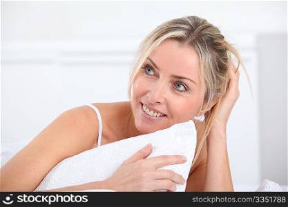 Portrait of beautiful blond woman in the morning