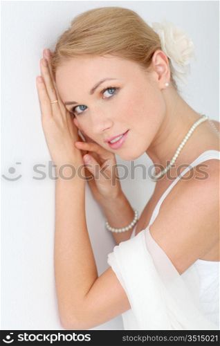 Portrait of beautiful bride on white background