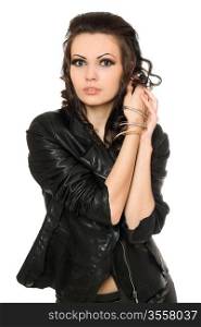 Portrait of beautiful brunette in black clothes. Isolated