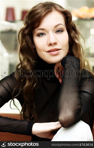 Portrait of beautiful brunette woman, indoor