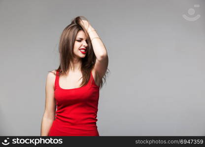 Portrait of beautiful brunette woman posing in studio. Portrait of beautiful brunette woman posing in studio.