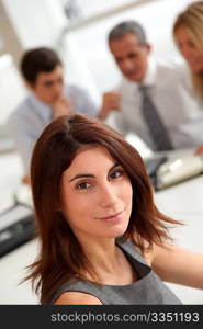 Portrait of beautiful businesswoman in work meeting