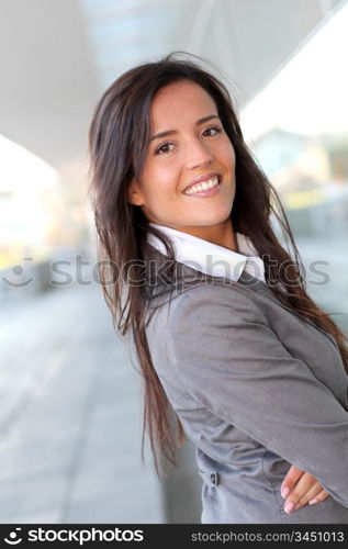 Portrait of beautiful businesswoman standing outside