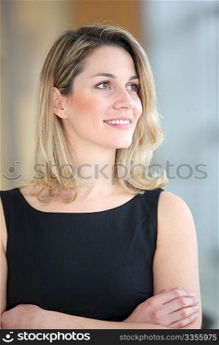 Portrait of beautiful businesswoman with arms crossed