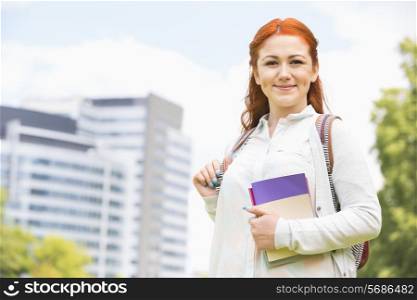 Portrait of beautiful college student at campus