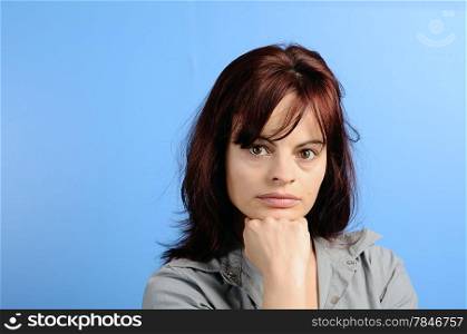 Portrait of Beautiful confident woman with serious expression