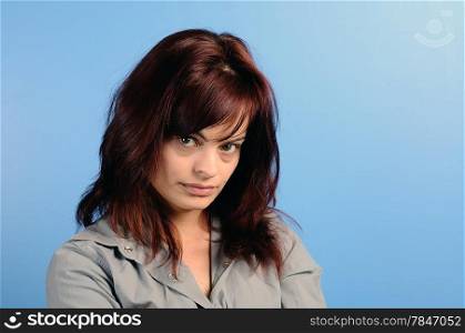 Portrait of Beautiful confident woman with serious expression