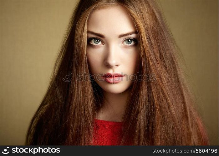 Portrait of beautiful dark-haired woman close up. Beauty photo
