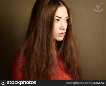 Portrait of beautiful dark-haired woman close up. Beauty photo