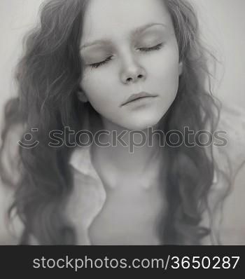 portrait of beautiful face with beautiful closed eyes