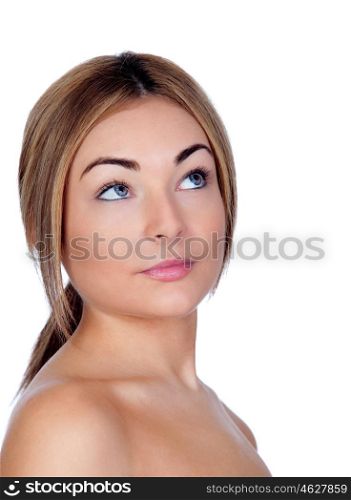 Portrait of beautiful female model looking up on white background