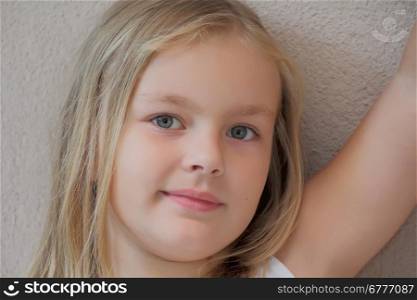 Portrait of beautiful girl with blue eyes