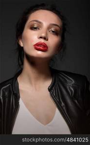 Portrait of beautiful girl with red lips. Fashion trend. Professional and stylish.