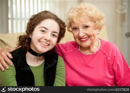 Portrait of beautiful grandmother and teen granddaughter.