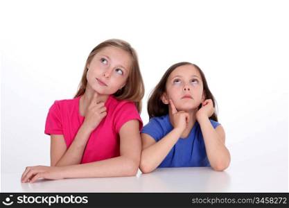 Portrait of beautiful little girls with thoughtful look
